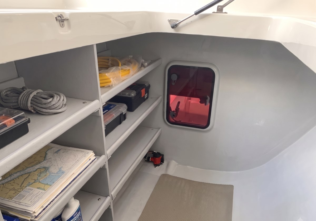 Rapido 50 - storage area beneath cockpit.