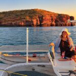 Meredith relaxing aboard Rapido 40 Lightning at Meredith Cove in Australia's remote Kimberley region.